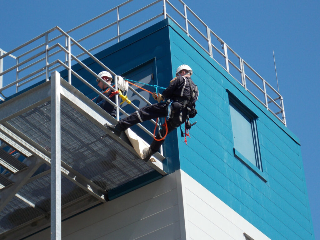 Rescue worker on building